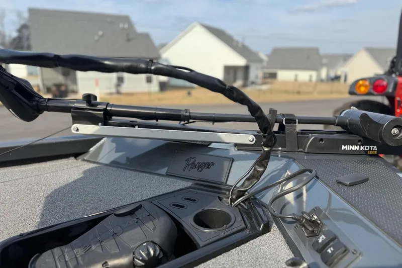 Slide: The Image of 2021 Ranger RT188 boat with Minn Kota Edge trolling motor, parked in residential area. - 7