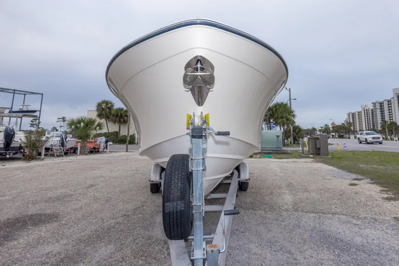 Slide: The Image of 2017 Grady-White Canyon 306 boat on trailer, parked near road. - 16