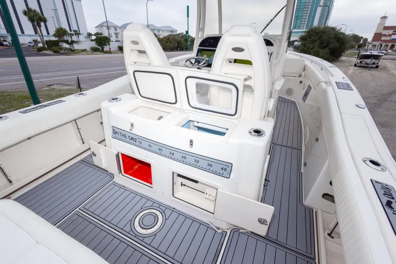 Slide: The Image of 2017 Grady-White Canyon 306 boat interior with seating and storage compartments. - 39