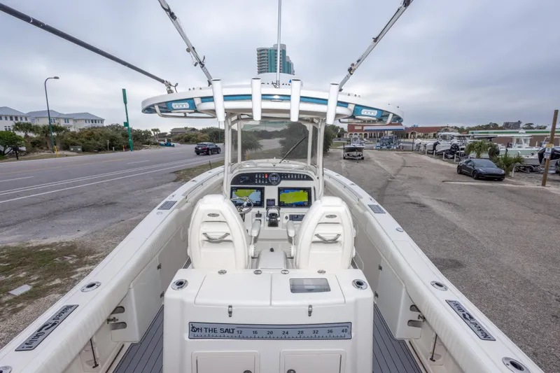 Slide: The Image of 2017 Grady-White Canyon 306 boat with dual helm seats and navigation equipment. - 42