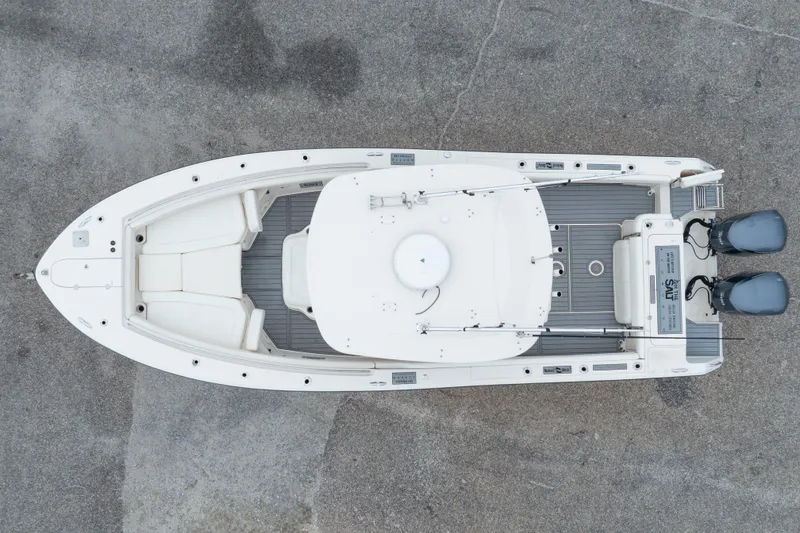 Slide: The Image of Overhead view of 2017 Grady-White Canyon 306 boat with dual engines on concrete. - 9