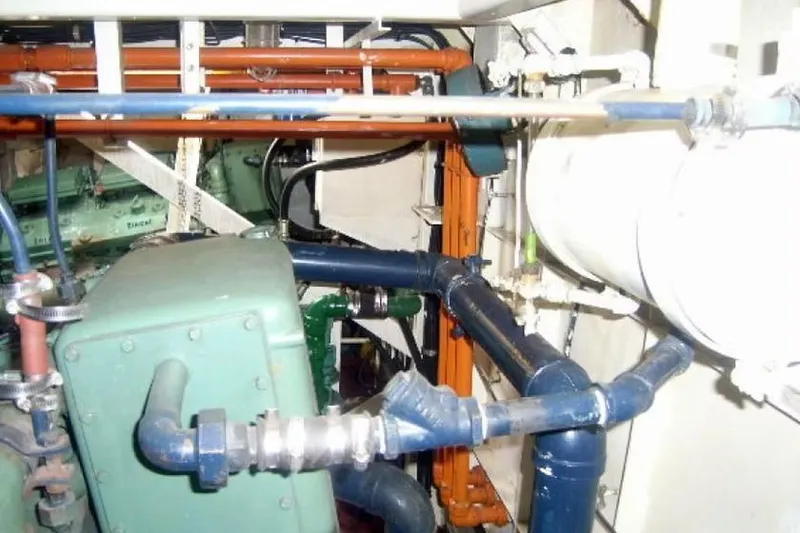 Slide: The Image of Engine room of 1987 Commercial LCU 8 with pipes and machinery. - 10