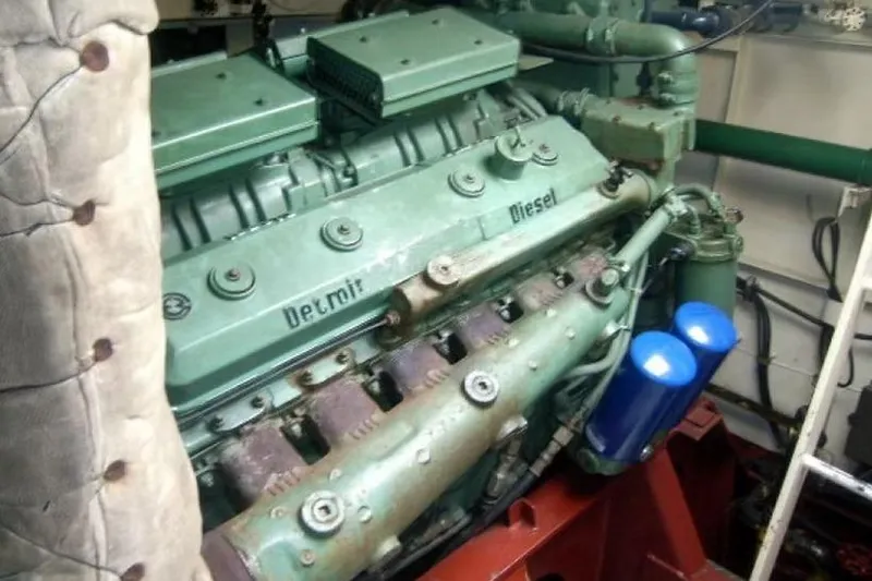 Slide: The Image of Detroit Diesel engine in a 1987 Commercial LCU 8 vessel, showcasing mechanical components. - 13