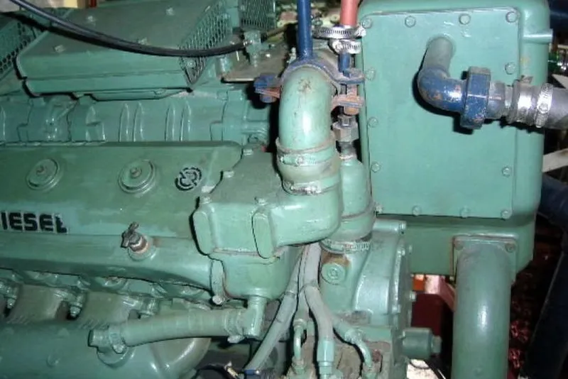 Slide: The Image of 1987 Commercial LCU 8 diesel engine with visible pipes and components. - 9