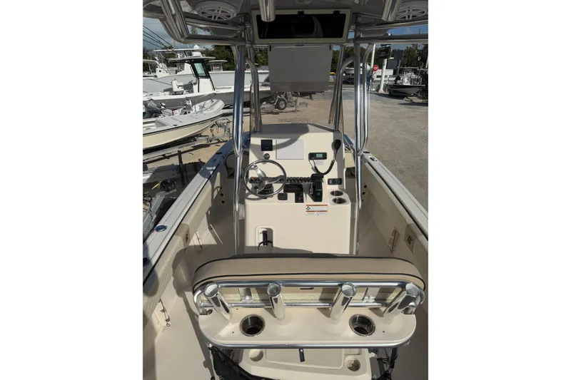 Slide: The Image of 2022 Carolina Skiff 23 UE boat interior with steering console and seating. - 13