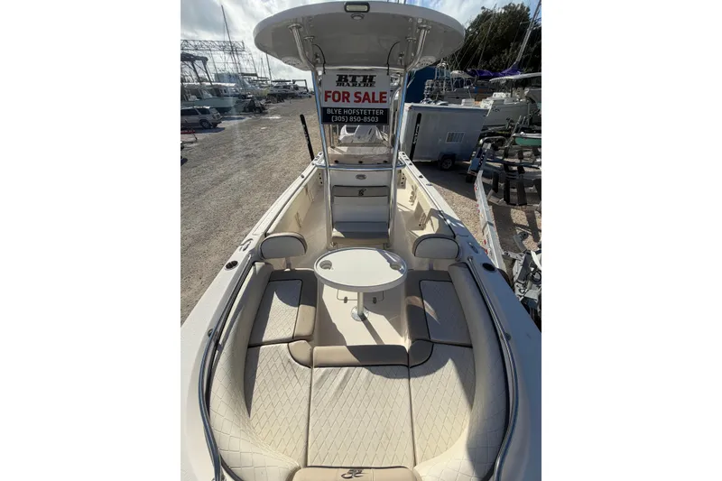 Slide: The Image of 2022 Carolina Skiff 23 UE boat for sale, featuring spacious seating and modern design. - 26