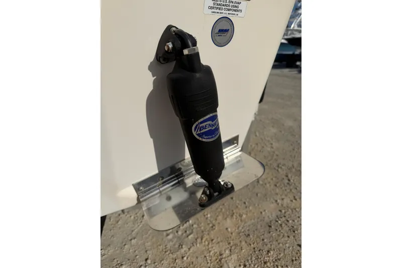 Slide: The Image of 2022 Carolina Skiff 23 UE boat with Bennett trim tab actuator. - 5