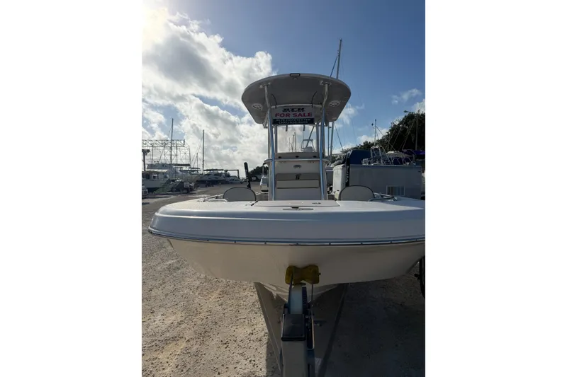 Slide: The Image of 2022 Carolina Skiff 23 UE boat for sale, parked on a sunny day. - 8