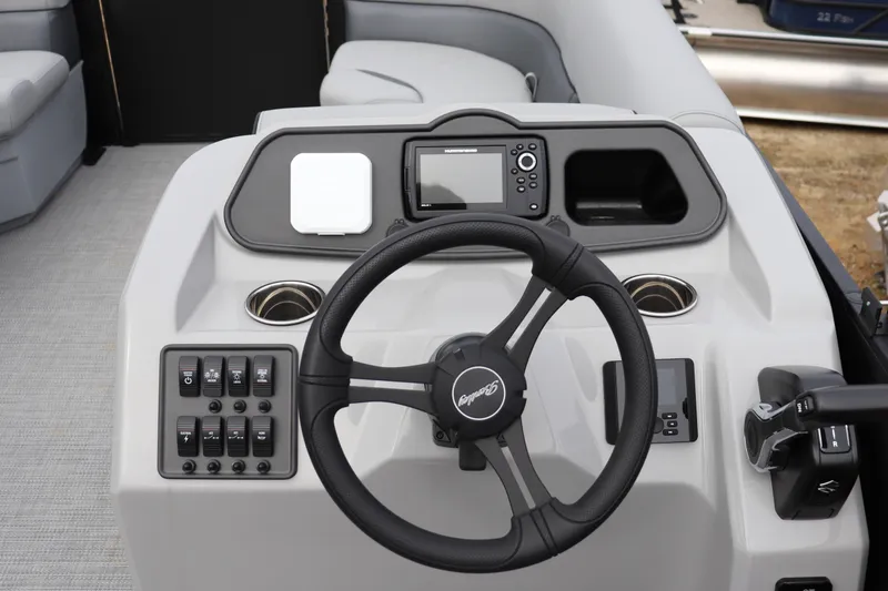 Slide: The Image of 2026 Bentley Pontoons 203 BOLT dashboard with steering wheel and control panel. - 5
