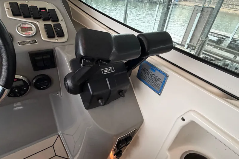 Slide: The Image of Control panel of 2006 Cruisers Yachts 300 Express with Volvo Penta throttle. - 25