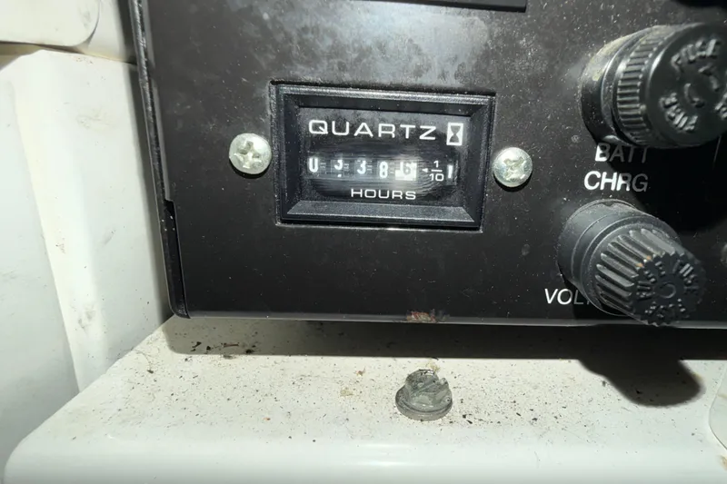 Slide: The Image of Hour meter on 2006 Cruisers Yachts 300 Express dashboard, showing 386.1 hours. - 38