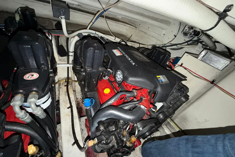 Slide: The Image of Engine compartment of a 2006 Cruisers Yachts 300 Express, featuring a Volvo Penta engine. - 40
