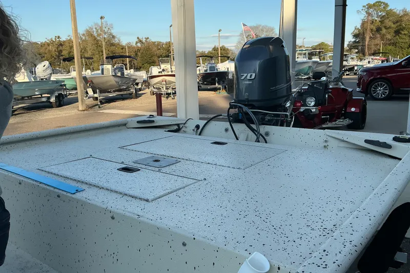 Slide: The Image of 2013 Xpress XP18CC boat with Yamaha 70 outboard motor at a dealership. - 5