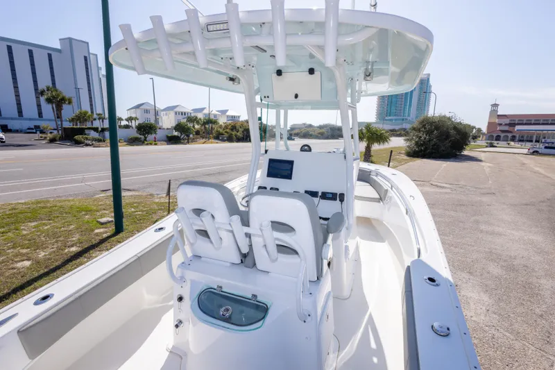 Slide: The Image of 2024 Cape Horn 24 XS boat interior with modern console and seating. - 33