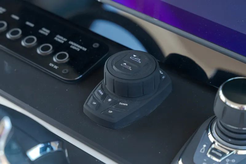 Slide: The Image of Close-up of a Saxdor 320 GTO control console with modern controls. - 25
