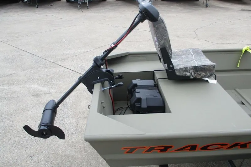 Slide: The Image of 2025 Tracker Grizzly 1436 Utility boat with motor and camo seat. - 6
