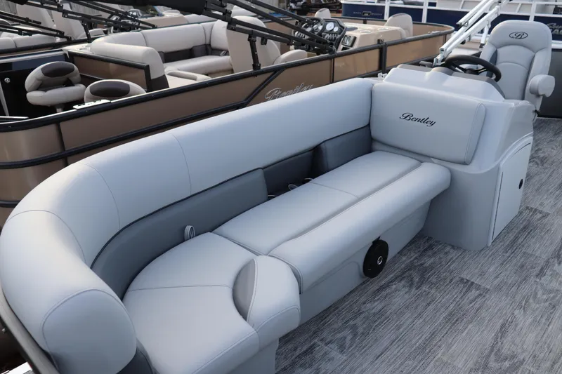 Slide: The Image of 2026 Bentley Pontoons LE 200 Cruise with luxurious seating and modern design. - 2