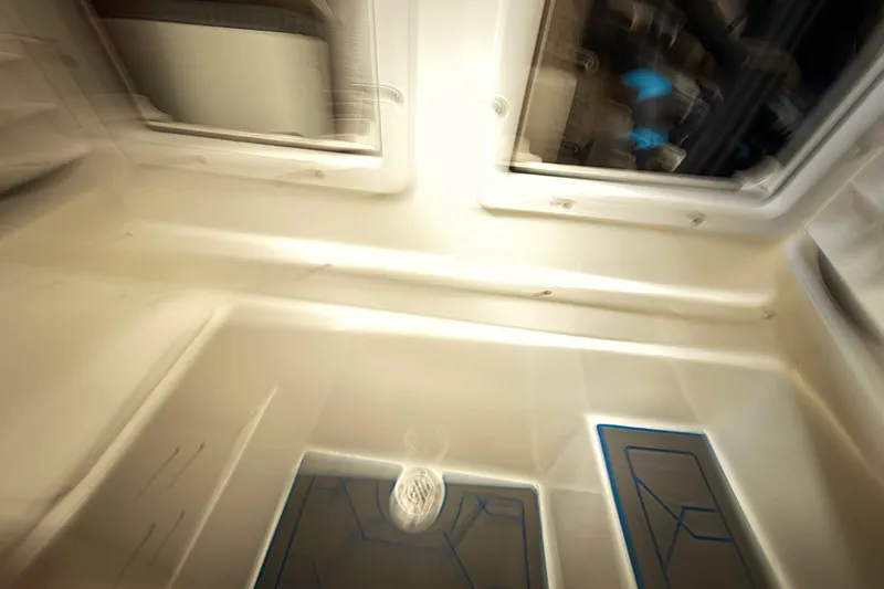 Slide: The Image of Interior detail of 2016 Extreme Boats XC 38 Express, featuring a mounted black device. - 134