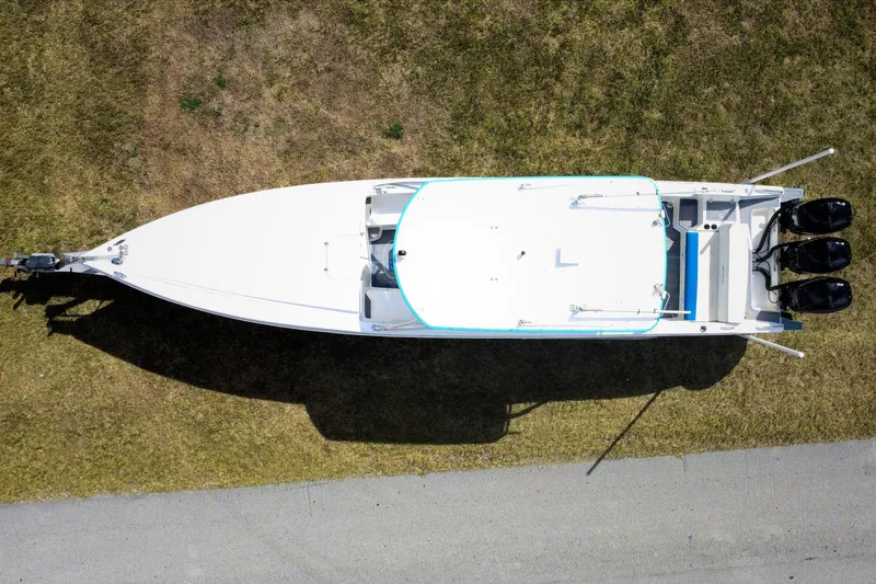Slide: The Image of Overhead view of 2016 Extreme Boats XC 38 Express on grass. - 14