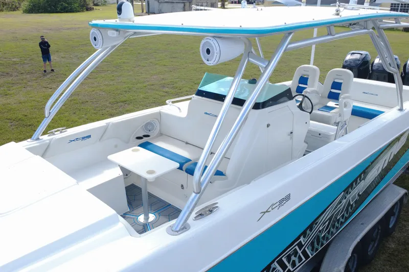 Slide: The Image of 2016 Extreme Boats XC 38 Express with sleek design and spacious seating on display. - 16