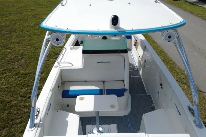Slide: The Image of 2016 Extreme Boats XC 38 Express, spacious deck with seating and modern design. - 17