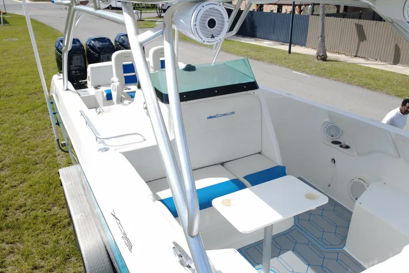 Slide: The Image of 2016 Extreme Boats XC 38 Express, spacious deck with seating and modern amenities. - 18