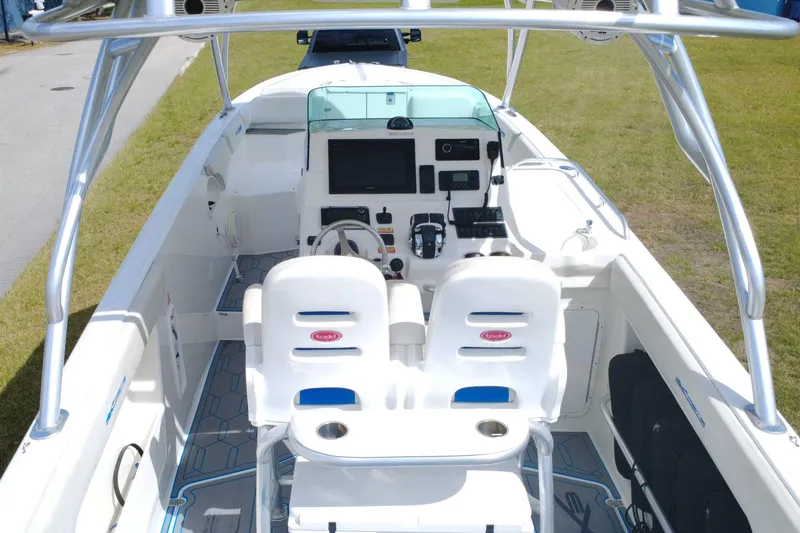 Slide: The Image of 2016 Extreme Boats XC 38 Express interior with dual seats and modern dashboard. - 20