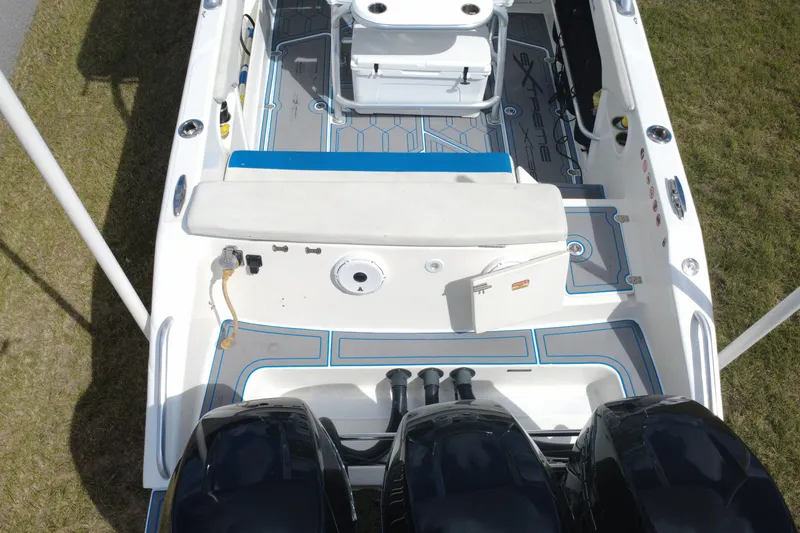Slide: The Image of 2016 Extreme Boats XC 38 Express, top view of deck and triple engines. - 21