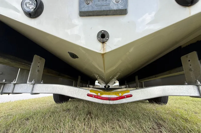 Slide: The Image of Underside view of 2016 Extreme Boats XC 38 Express on trailer. - 72