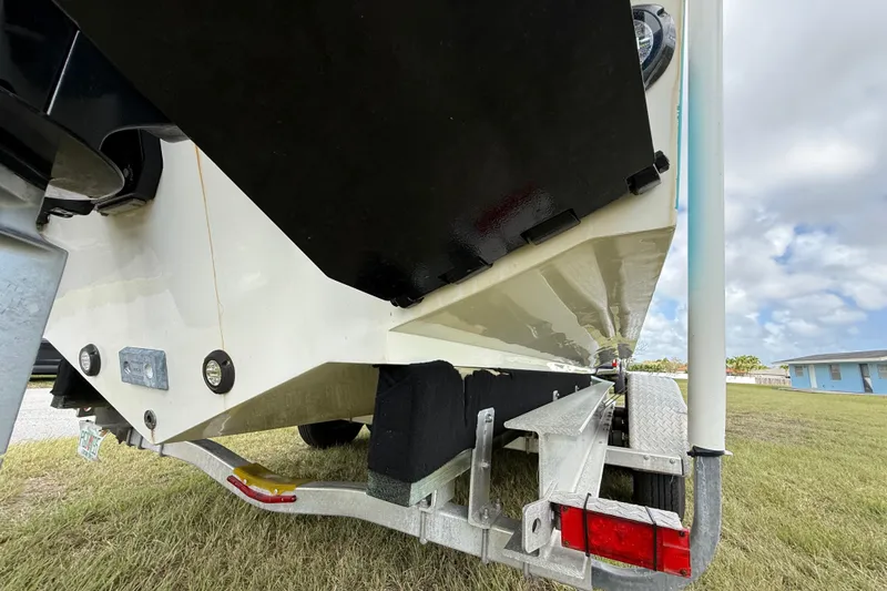 Slide: The Image of 2016 Extreme Boats XC 38 Express on trailer, showcasing hull and trailer details. - 74