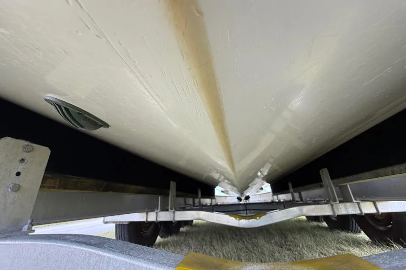 Slide: The Image of Underside view of 2016 Extreme Boats XC 38 Express on a trailer. - 76