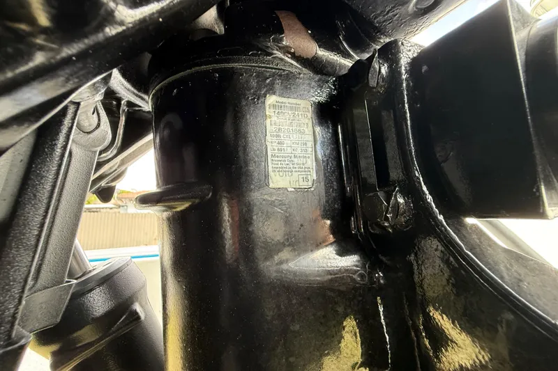 Slide: The Image of Close-up of a 2016 Extreme Boats XC 38 Express engine component with label details. - 79