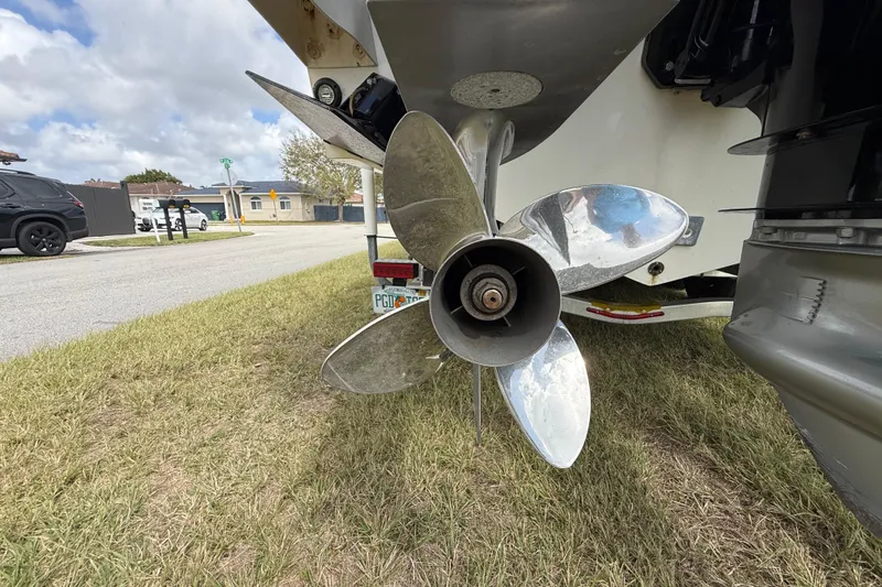 Slide: The Image of Propeller of 2016 Extreme Boats XC 38 Express on grass, showcasing its polished blades. - 85
