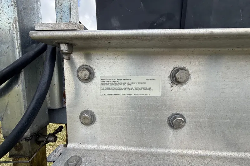 Slide: The Image of Metal structure with bolts and a label, related to Extreme Boats XC 38 Express 2016. - 92
