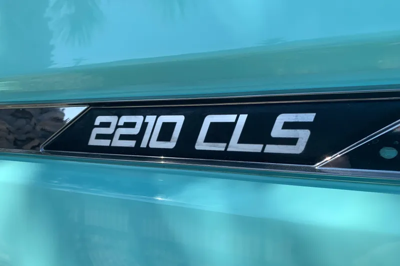 Slide: The Image of 2024 Silver Wave 2210CLS model emblem on a turquoise background. - 17