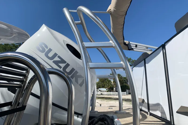 Slide: The Image of 2024 Silver Wave 2210CLS boat with Suzuki engine and stainless steel ladder. - 23