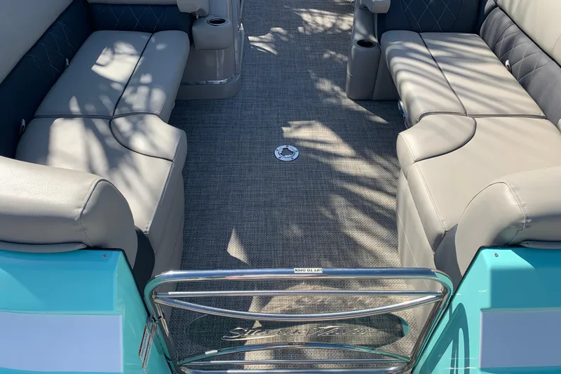 Slide: The Image of Interior of 2024 Silver Wave 2210CLS boat with plush seating and modern design. - 24