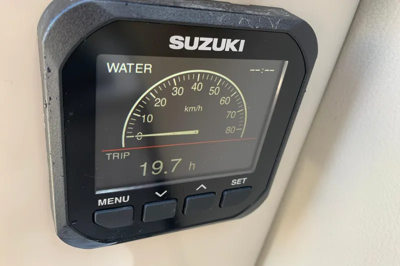 Slide: The Image of Suzuki water speedometer on 2024 Silver Wave 2210CLS, showing 19.7 hours trip time. - 27