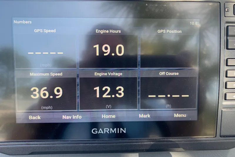 Slide: The Image of Garmin display showing Silver Wave 2210CLS boat metrics: engine hours, speed, and voltage. - 30