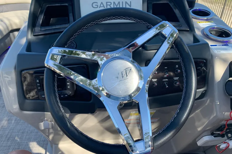 Slide: The Image of Steering wheel of 2024 Silver Wave 2210CLS boat with Garmin navigation system. - 31