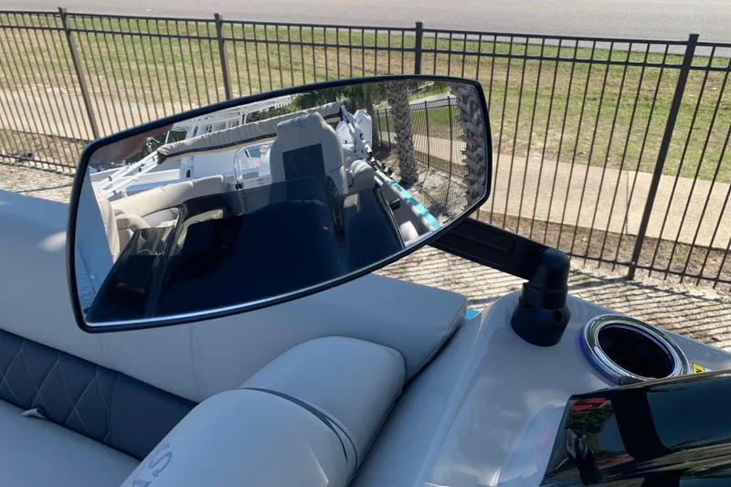 Slide: The Image of 2024 Silver Wave 2210CLS boat interior with rearview mirror reflection. - 32