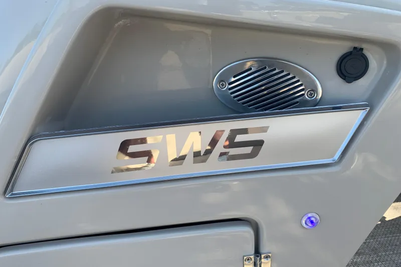 Slide: The Image of 2024 Silver Wave 2210CLS boat detail with SW5 logo and speaker. - 35