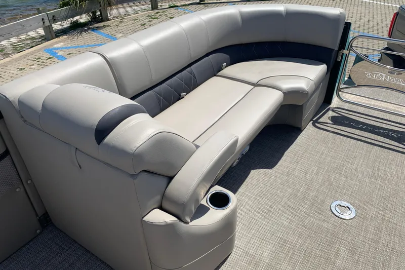 Slide: The Image of 2024 Silver Wave 2210CLS boat interior with luxurious seating and cup holder. - 8