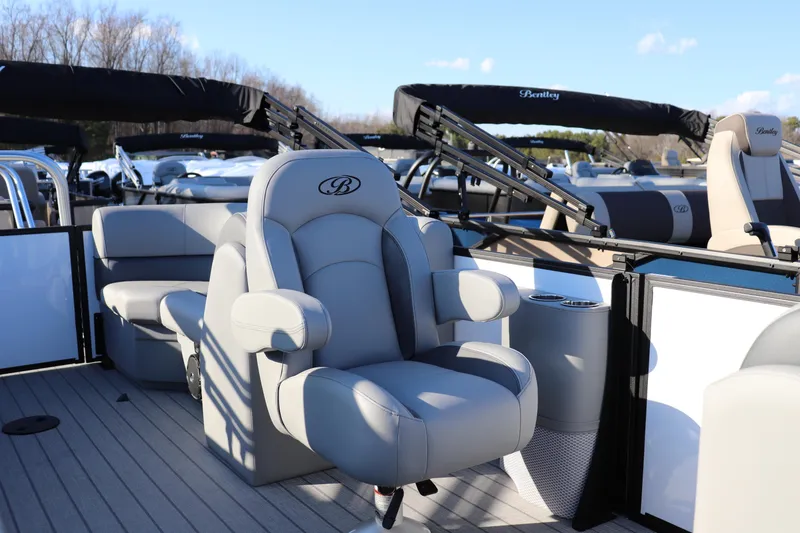 Slide: The Image of 2026 Bentley Pontoons Legacy 203 Navigator with luxurious seating and sleek design. - 6