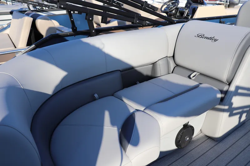 Slide: The Image of 2026 Bentley Pontoons Legacy 203 Navigator with luxurious gray seating and elegant design. - 7