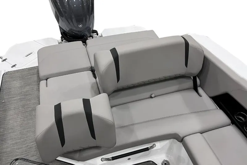 Slide: The Image of Manufacturer Provided Image: 2025 Four Winns H6 OB boat seating area with gray upholstery and modern design. - 2