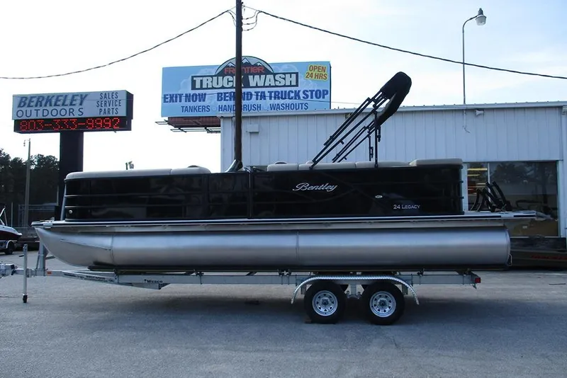 The Image of 2026 Bentley Pontoons Legacy 240 Cruise on trailer at outdoor dealership. - 1