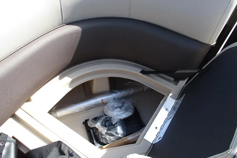Slide: The Image of Storage compartment in 2026 Bentley Pontoons Legacy 240 Cruise boat, featuring interior items. - 12