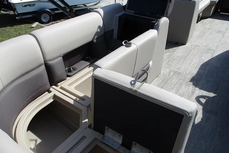Slide: The Image of 2026 Bentley Pontoons Legacy 240 Cruise interior with open storage compartments and seating. - 20