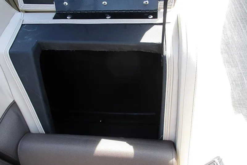 Slide: The Image of Open storage compartment in 2026 Bentley Pontoons Legacy 240 Cruise boat. - 21